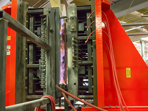 image of the tilt pour casting process at Watry Industries aluminum foundry