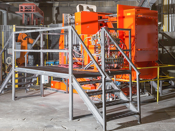 image of a Hall tilt pour machine at Watry Industries aluminum casting foundry